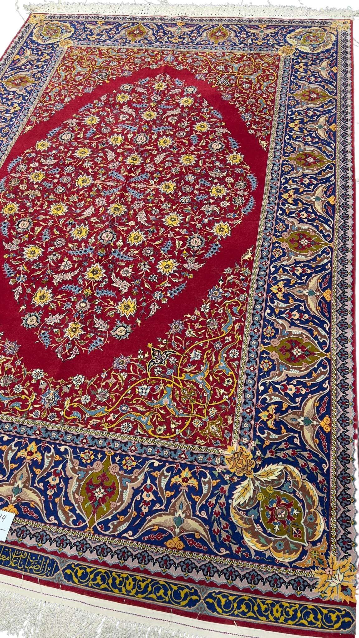 "Collectible red Persian rug with natural dyed wool and silk, 70 years old"